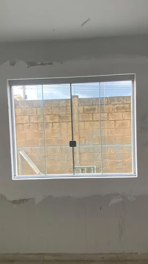 Janela de correr de quatro folhas em vidro
